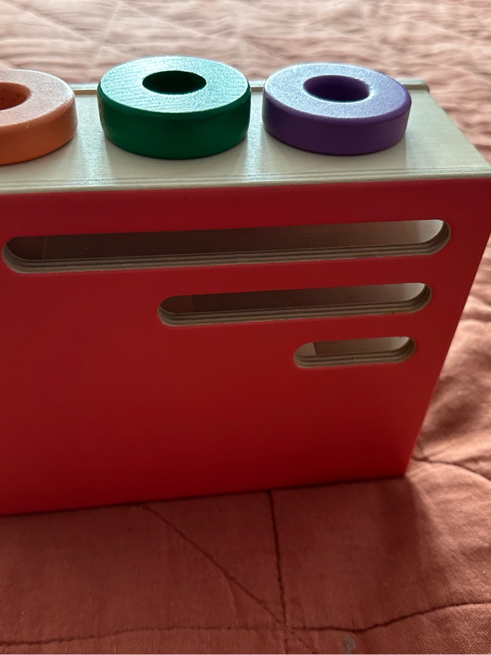 Stacking Ring Drop Toy - Red with Orange, Green, Purple Rings